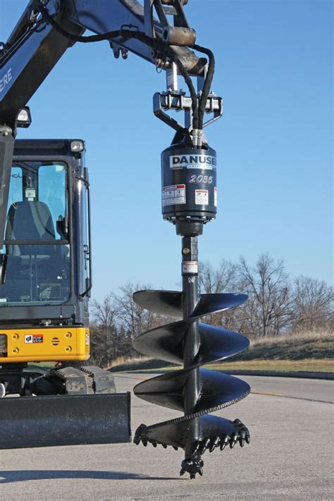 excavator with auger attachment